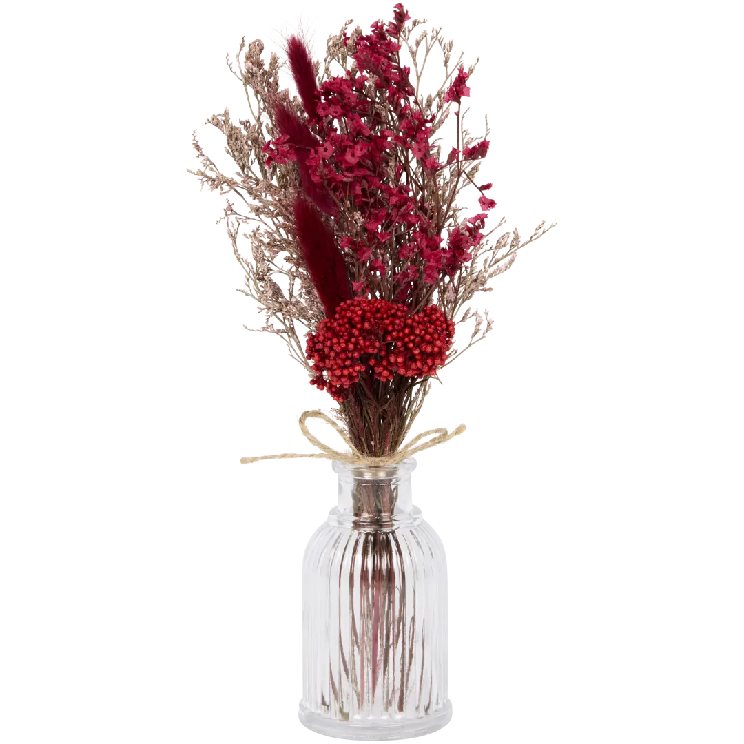 Bouquet séché dans vase en verre