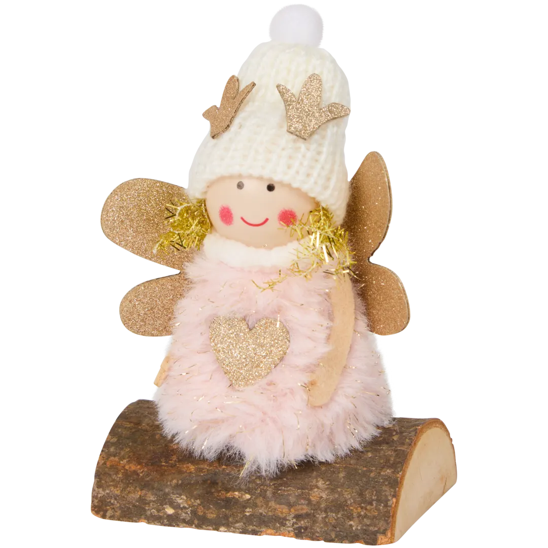 Ángel de Navidad en tronco