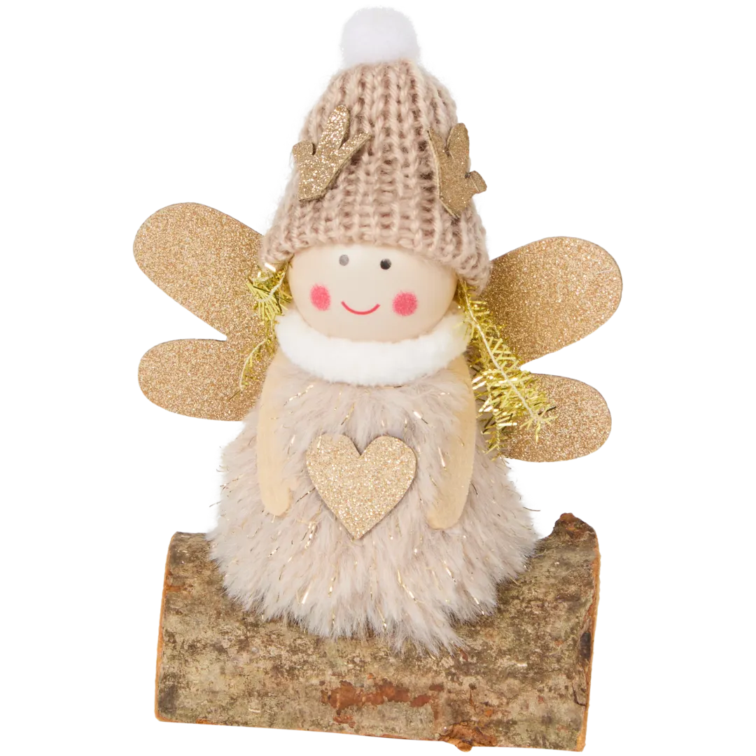 Ángel de Navidad en tronco