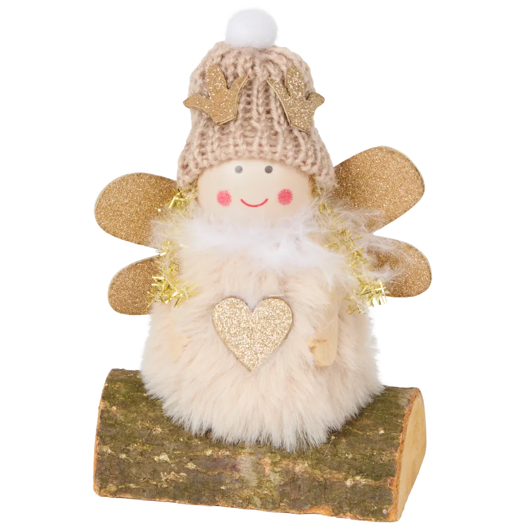 Ángel de Navidad en tronco