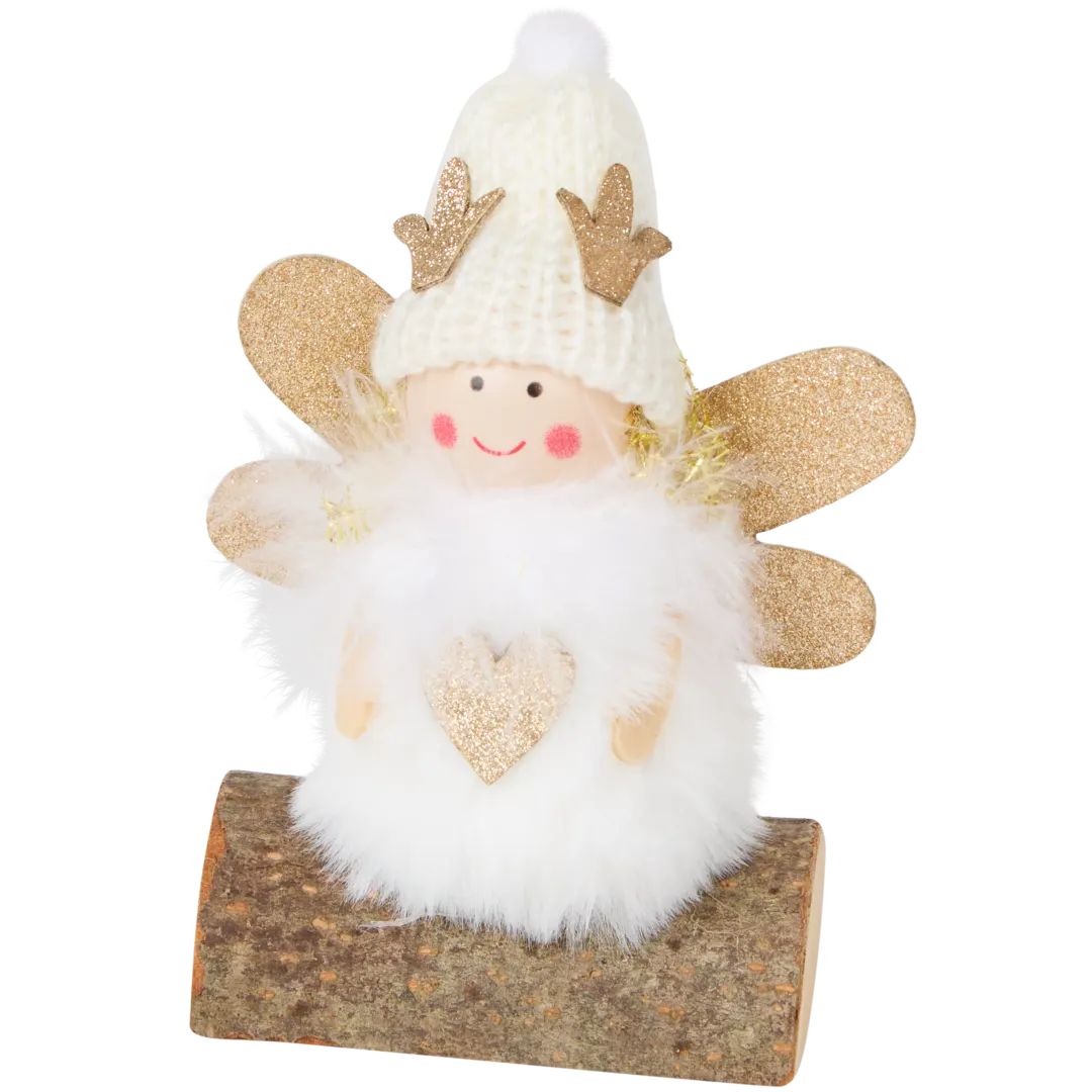 Ángel de Navidad en tronco