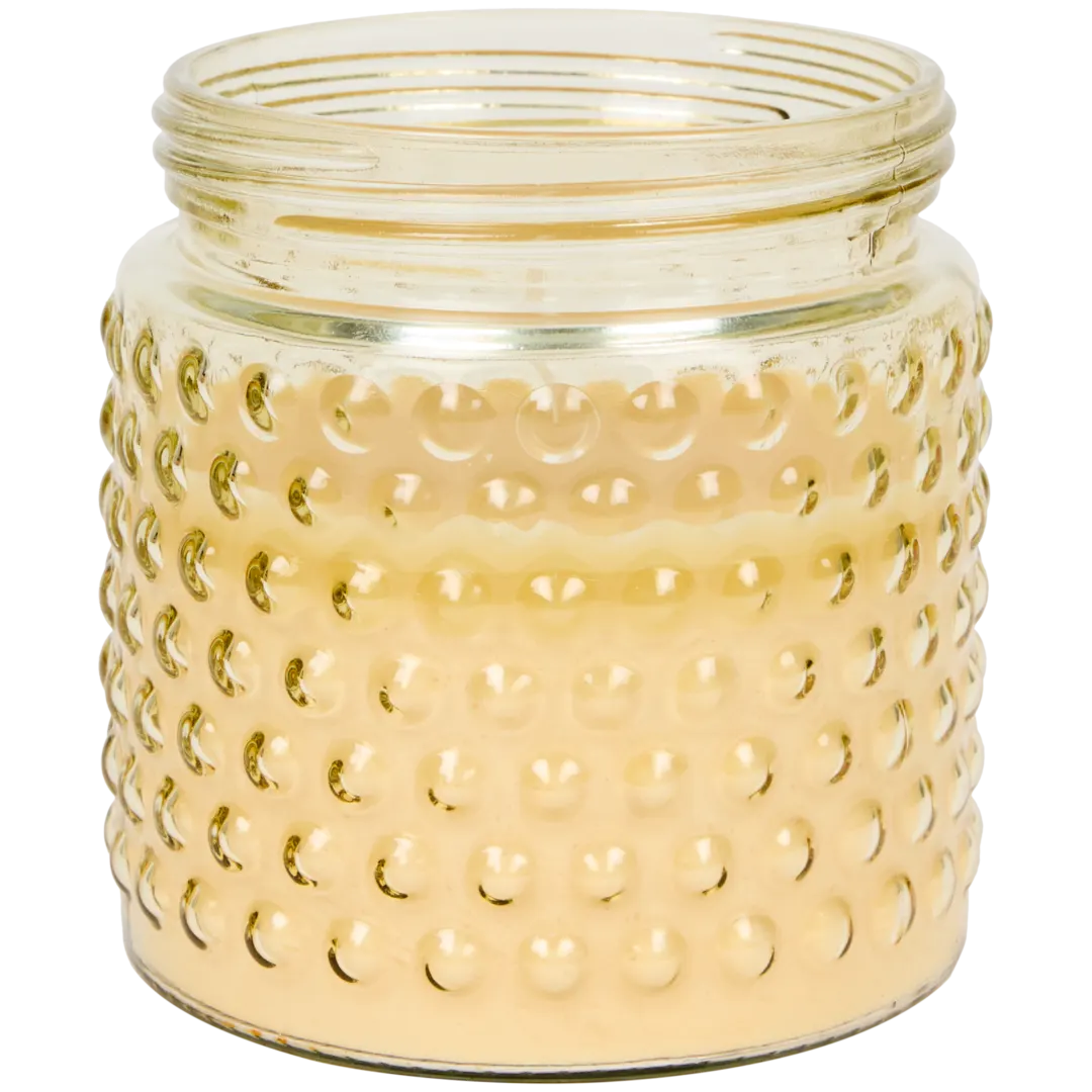 Bougie à la citronnelle dans pot en verre