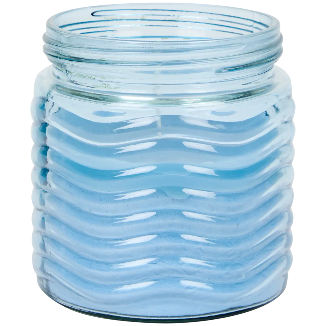 Bougie à la citronnelle dans pot en verre