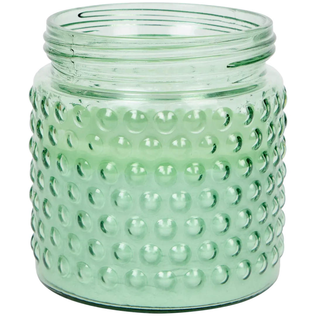 Bougie à la citronnelle dans pot en verre
